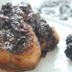 French toast topped with blackberry rum sauce.
