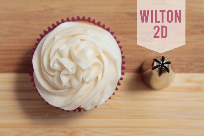 Wilton 2D frosting tip next to a cupcake frosted with that tip.