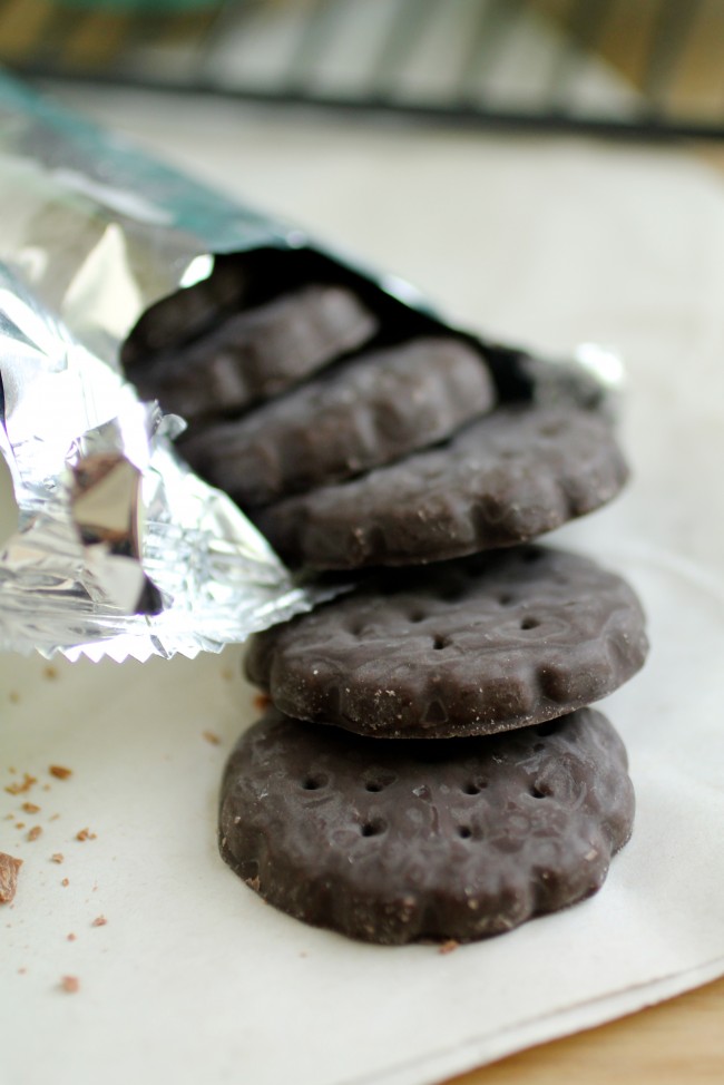 Thin mint cookies falling out of a foil wrapper.