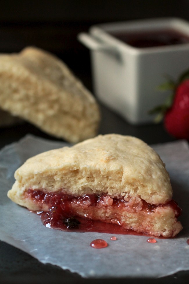 Strawberry jam on a scone.