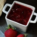 Square dish of homemade strawberry jam