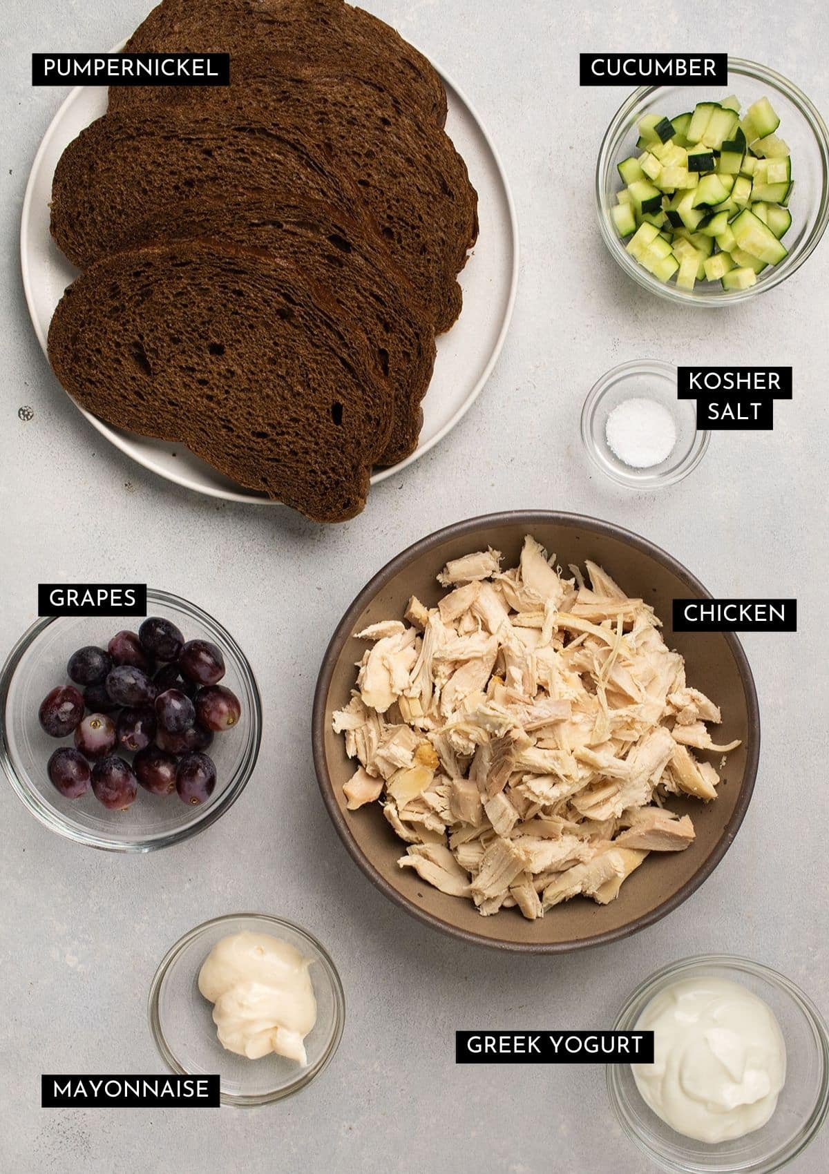 Chicken salad sandwich ingredients, organized into individual bowls.