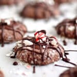 Chocolate peppermint cookies on a white surface.
