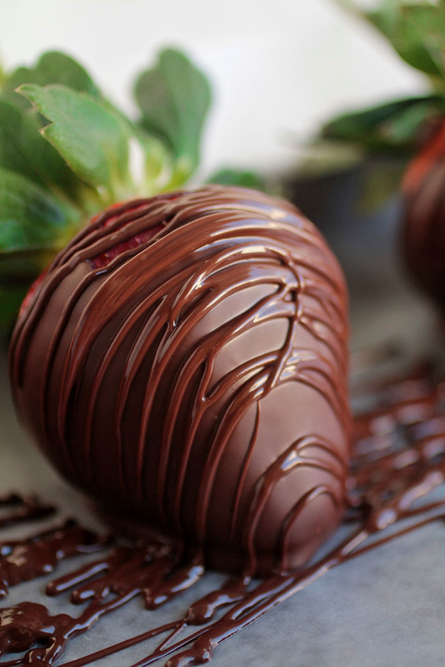 Fresh strawberry dipped in chocolate and drizzled with more chocolate.