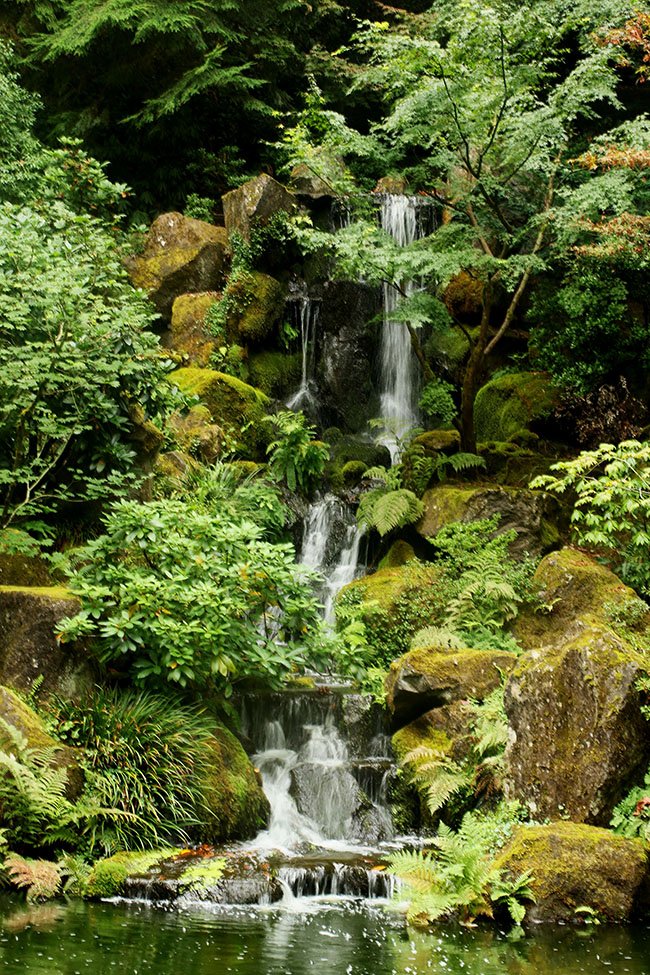 A large waterfall at Portland Japanese Gardens.