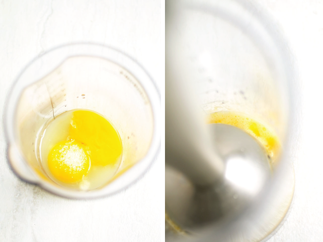 Blending egg yolk and melted butter to make hollandaise.