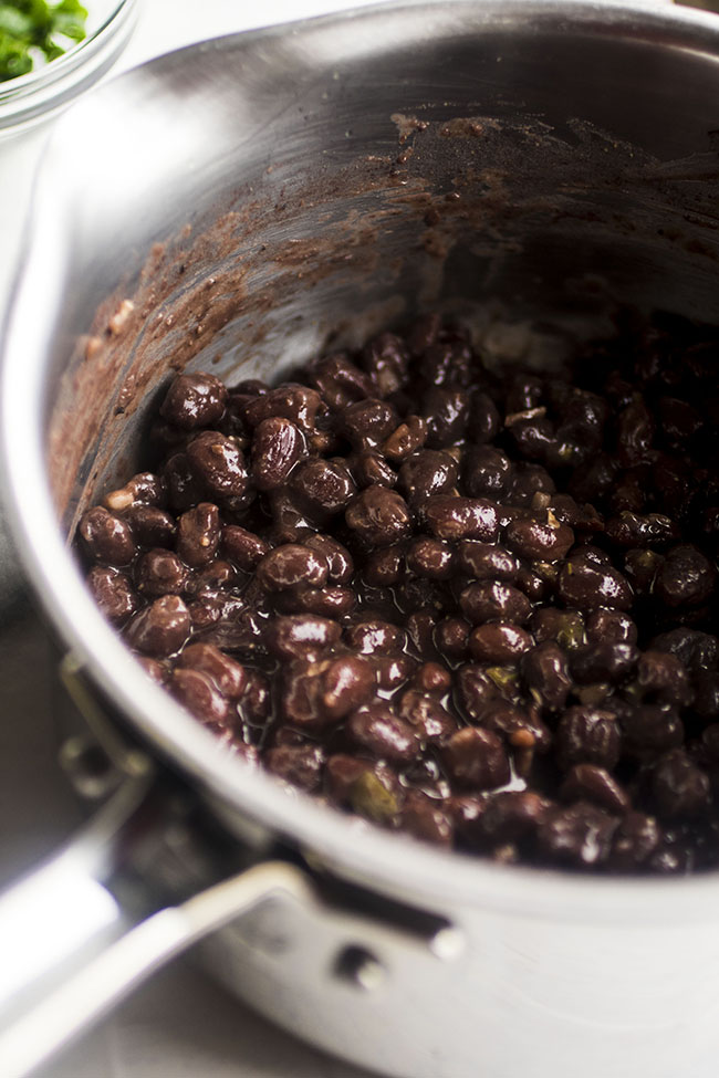 Black beans in a saucepan.