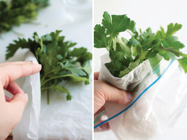 Wrapping parsley in a damp paper towel and placing it in a plastic bag.