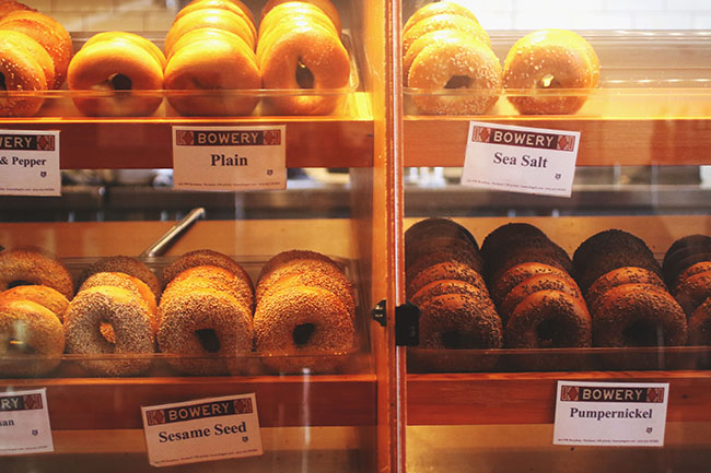 Racks of bagels at the Bowery Bagels store.