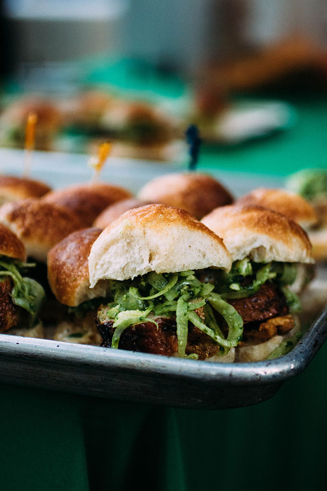 A sheet pan filled with slider sandwiches.