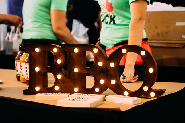 A light up sign that says BBQ.