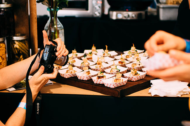 A tray of appetizers on a brown table.