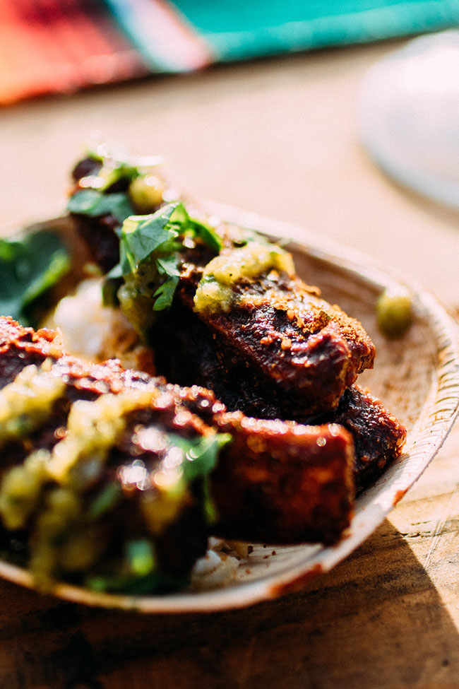 Ribs with green sauce and fresh cilantro.