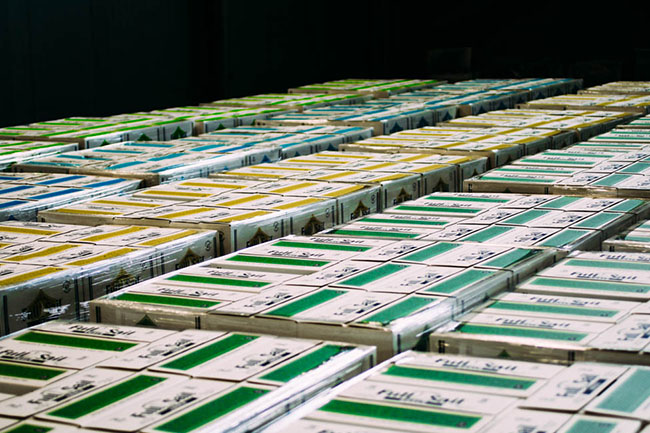 Looking out over a warehouse floor filled with cases of beer.