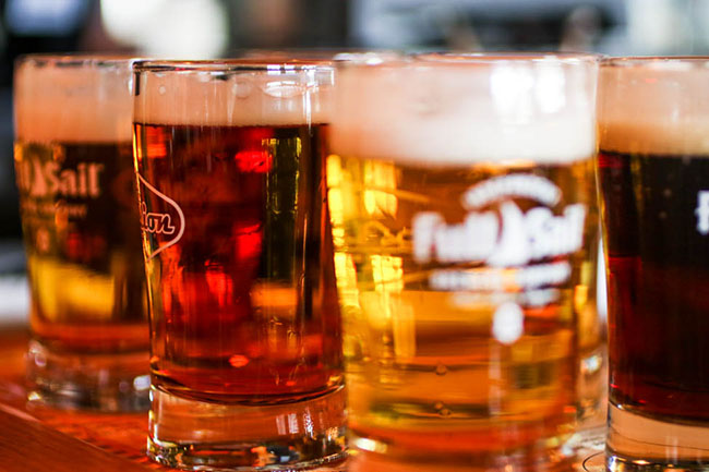 Tasting glasses filled with beer.