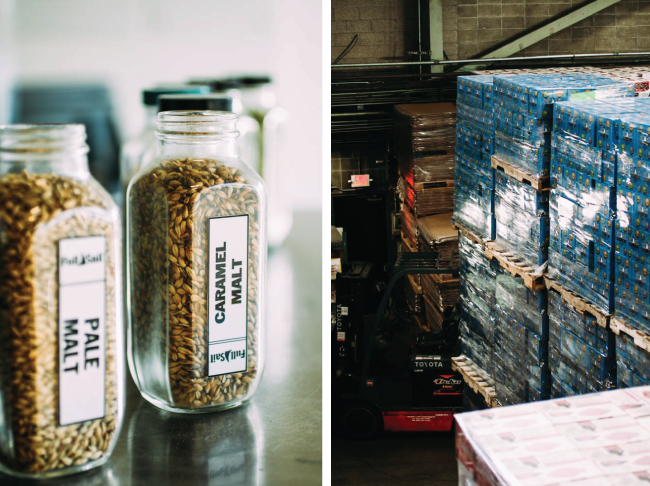 A glass jar of hop pellets in the middle of a brewery.