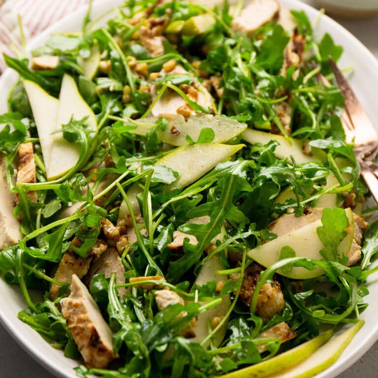 Grilled chicken arugula salad.