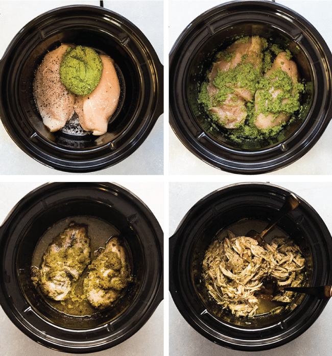 Chicken breasts and pesto in the bowl of a slow cooker.