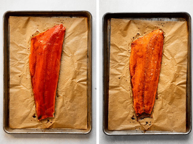 Sockeye salmon fillet on a dark baking sheet lined with brown parchment paper.