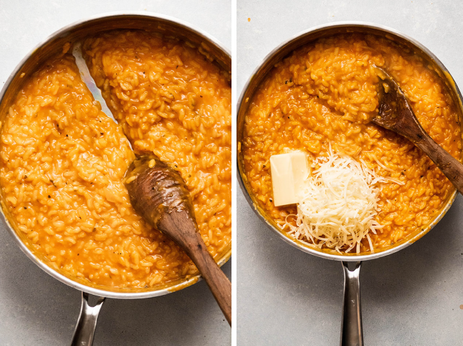 Wooden spoon stirring butter and parmesan cheese into a wide silver skillet full of orange butternut squash risotto.