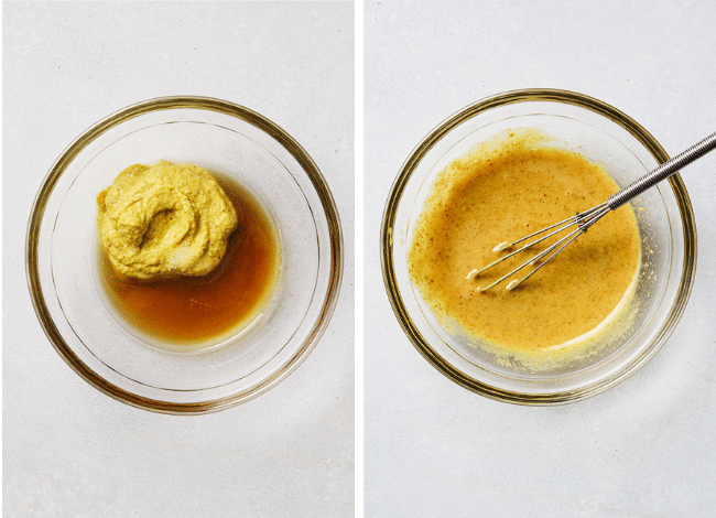 Whisking mustard, maple syrup, and lemon juice together in a small glass bowl.