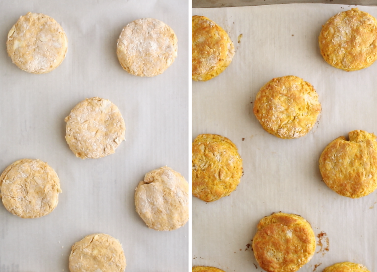 Pumpkin biscuits on a baking sheet lined with white parchment paper.