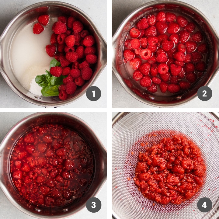 Raspberries, sugar, water, and basil in a small silver saucepan.