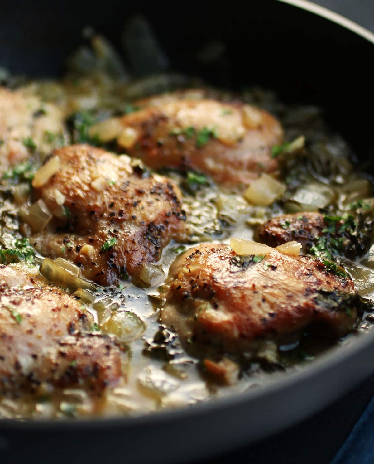 Close up of baked chicken thighs.