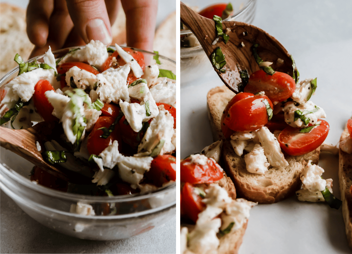 Wooden spoon stirring cherry tomatoes and mozzarella together in a glass bowl.