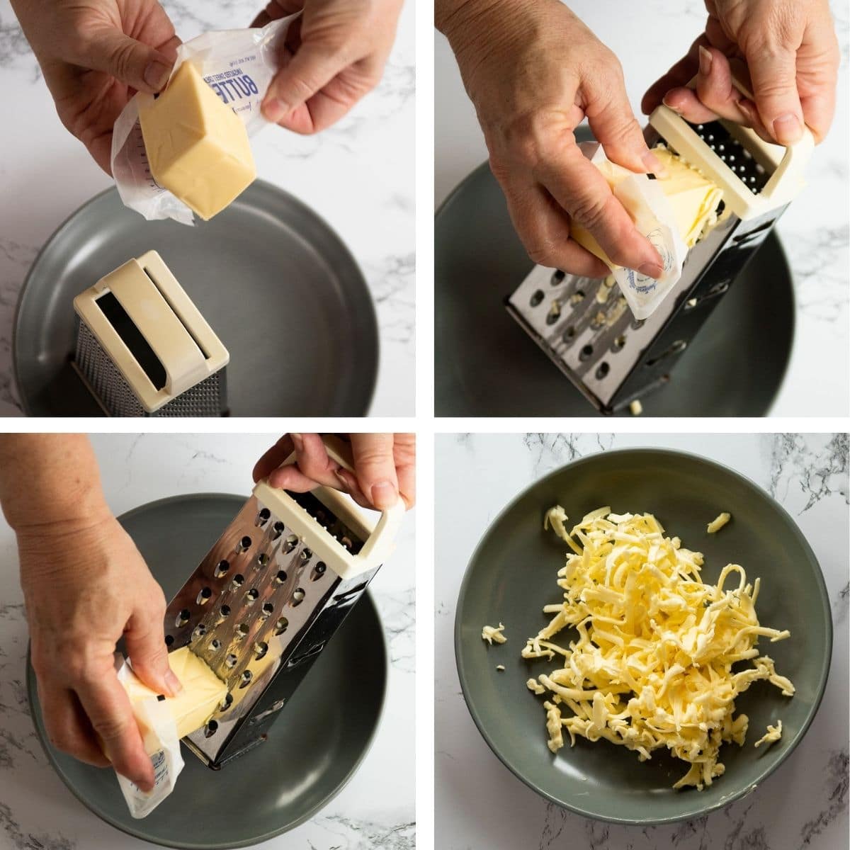Hands shredding a stick of cold butter with a box grater.