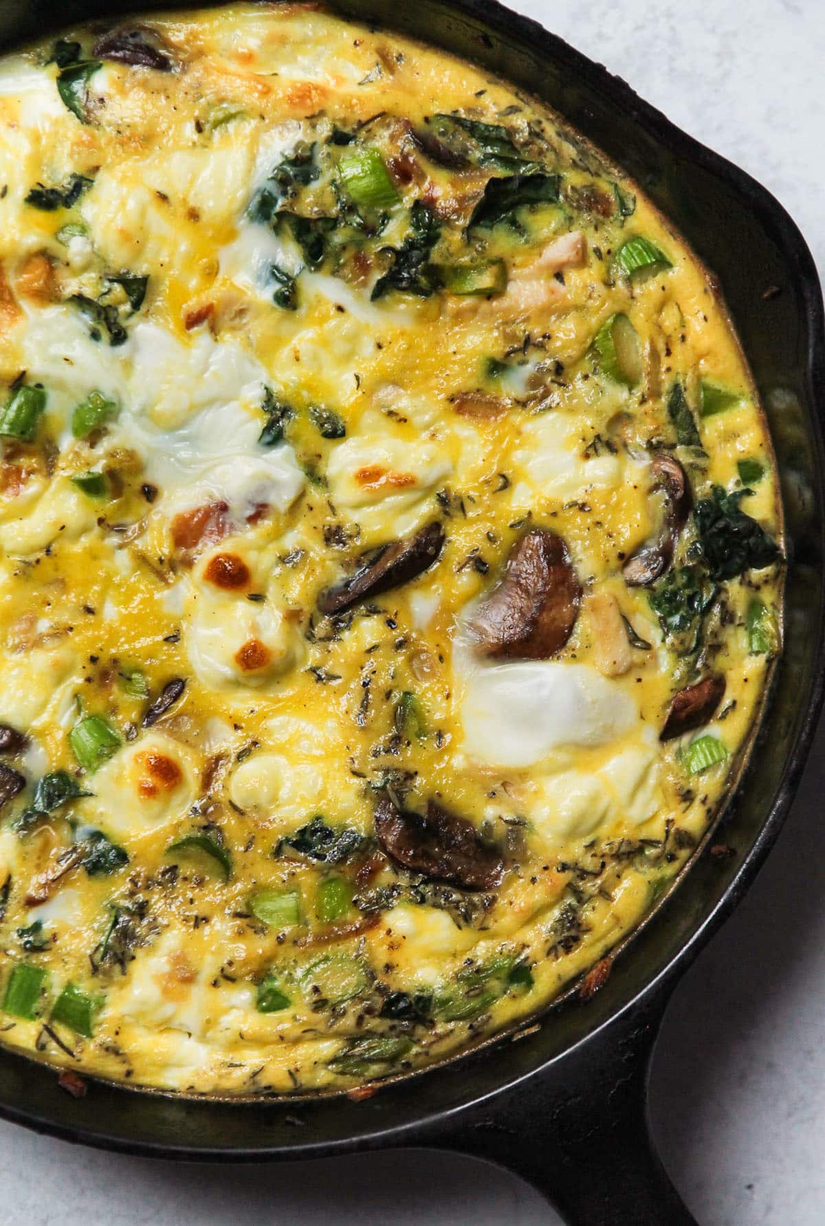 Turkey frittata in a large cast iron skillet.