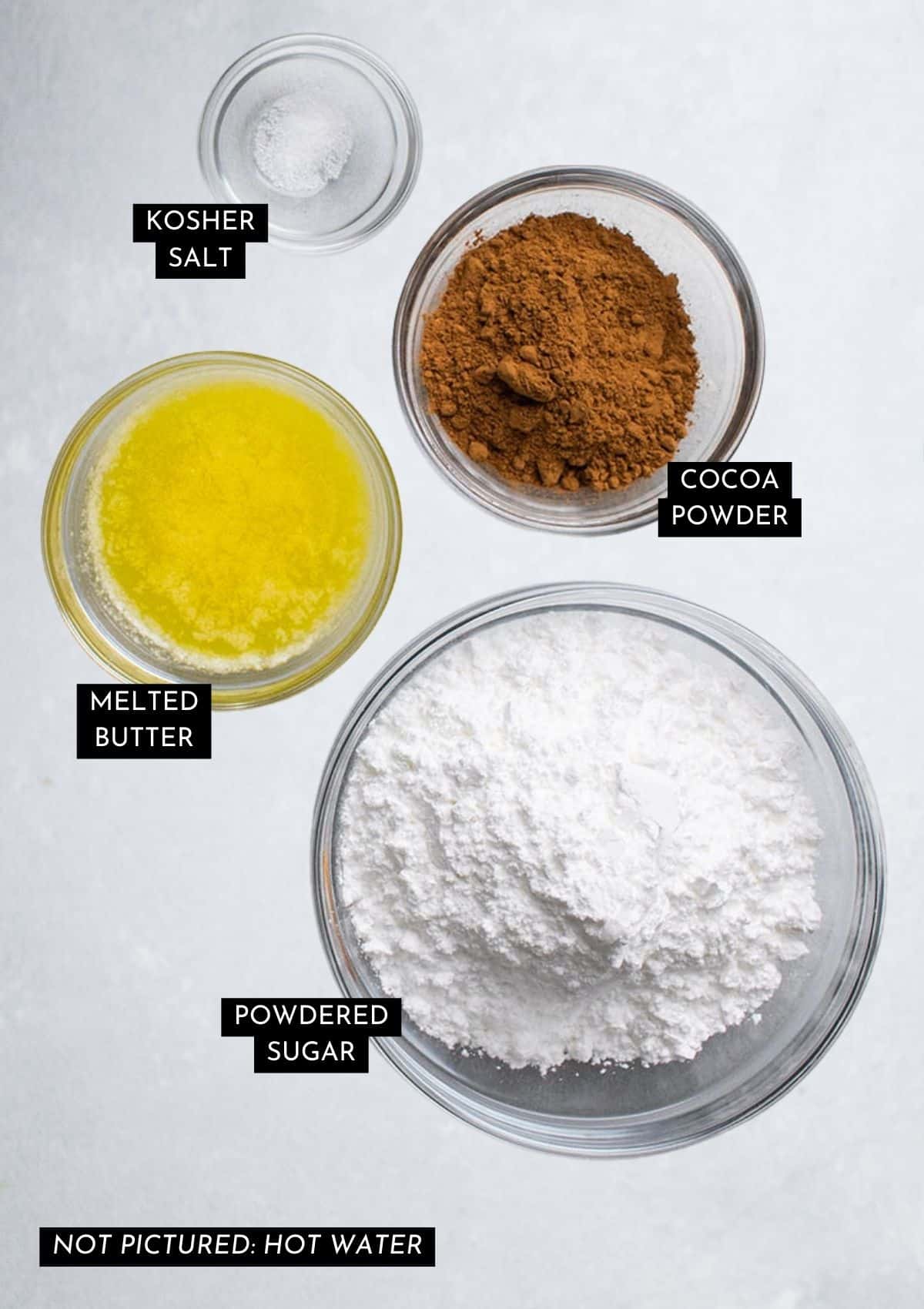Fudge frosting ingredients, organized into individual bowls.