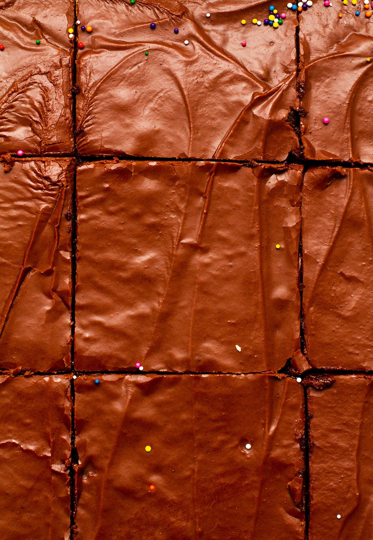 Chocolate sheet cake, cut into squares.