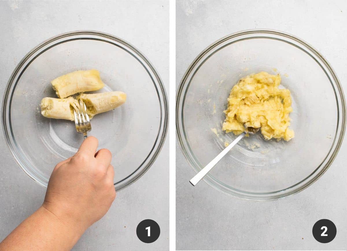 Mashing a banana with fork in a glass bowl.