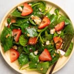 Spinach salad with strawberries and goat cheese.