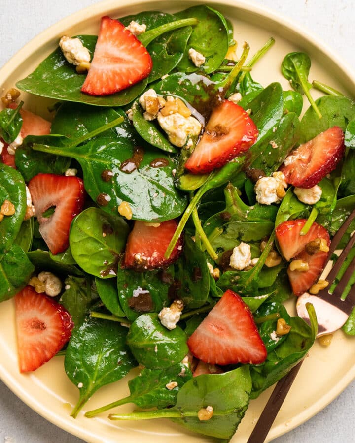 Spinach salad with strawberries and goat cheese.