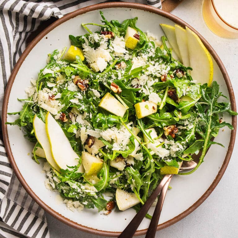 Arugula pear salad with toasted pecans.