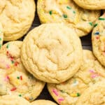 Sugar cookies on a cooling rack.