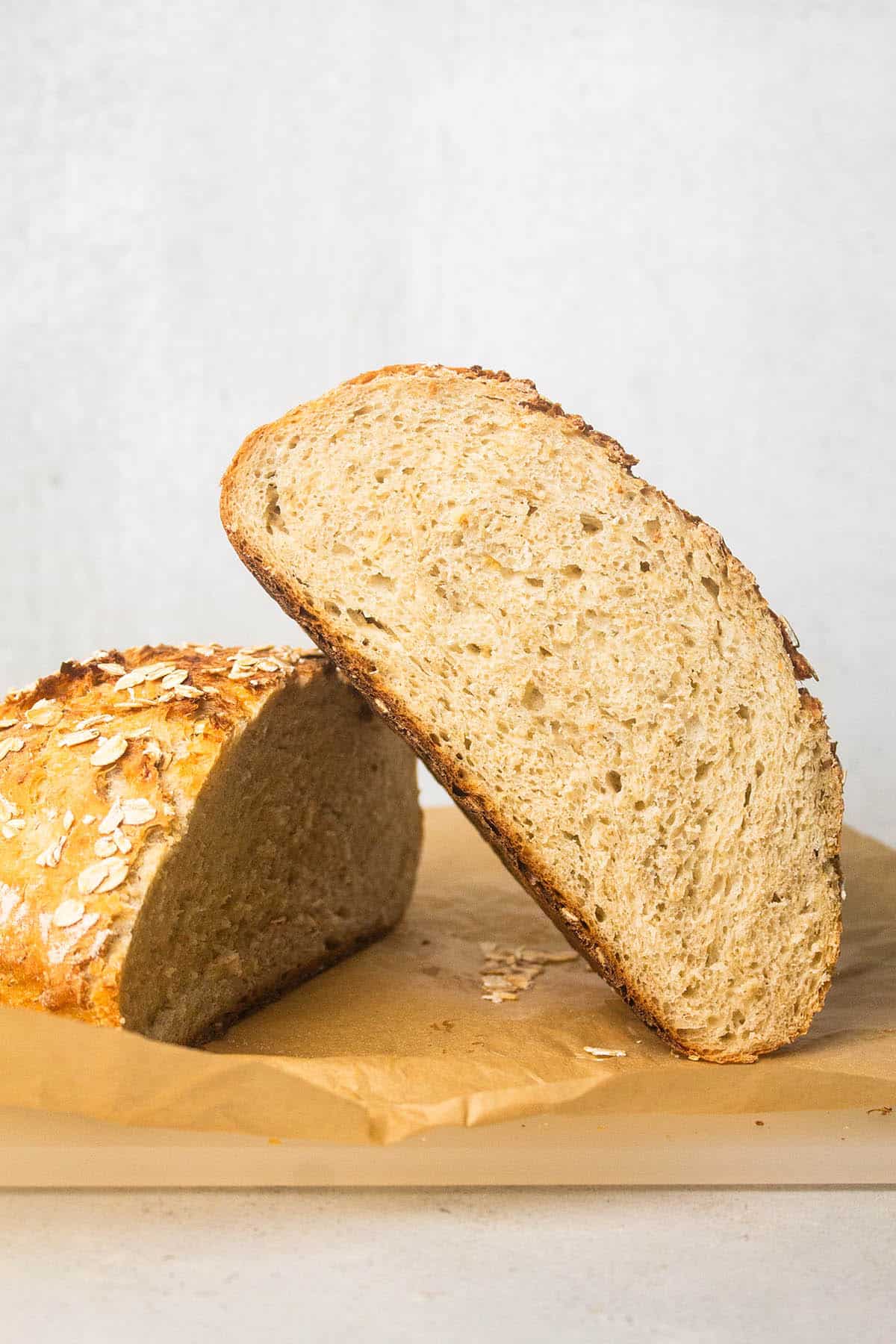Loaf of bread, cut in half to show texture.